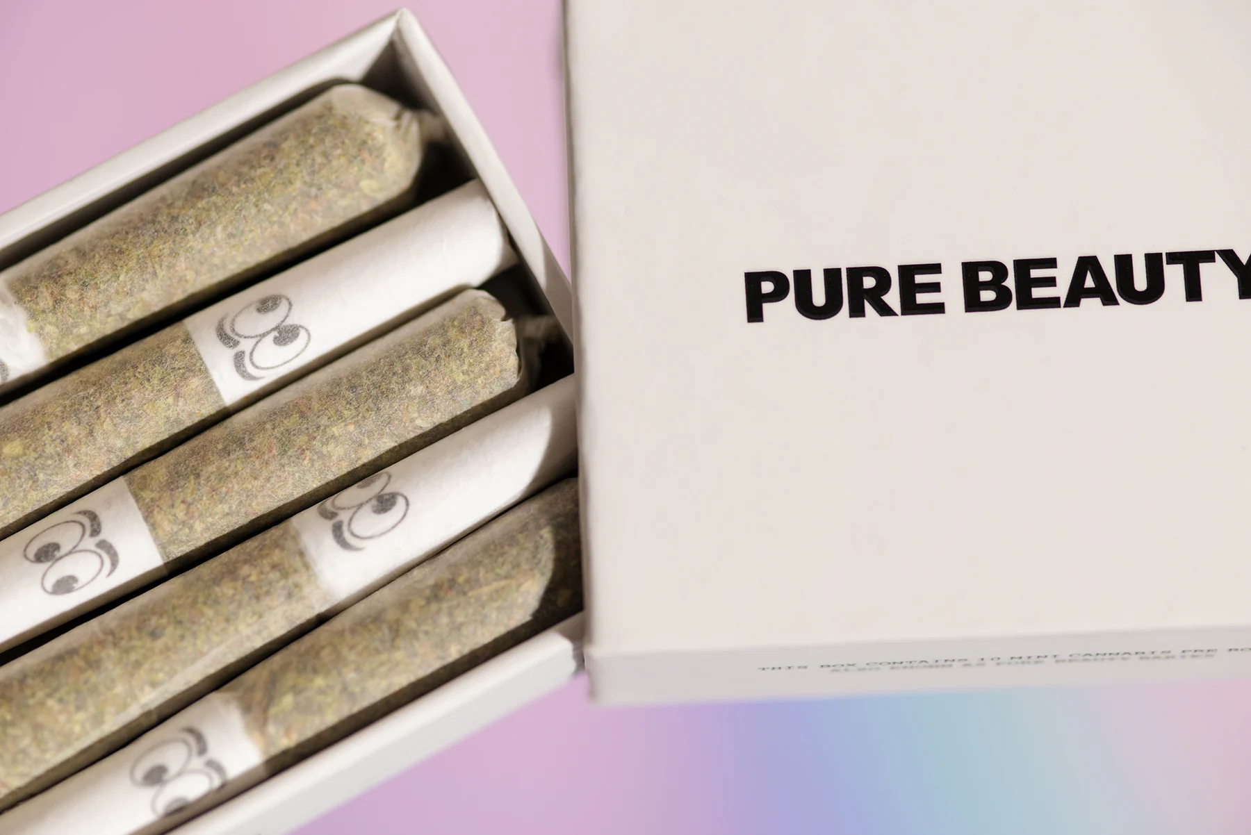 Close-up of Pure Beauty Babies pre-rolls and branded ten-pack packaging
